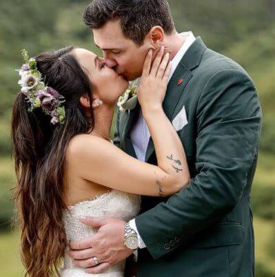 Chris Long and his wife Janel Parrish at their wedding